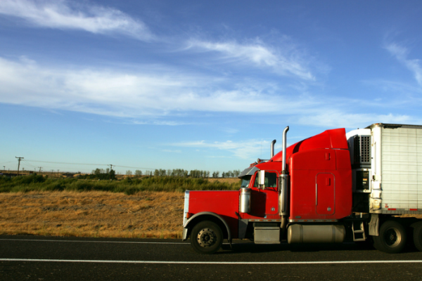 Semi truck going fast on interstate highway