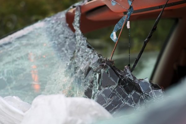 Close-up of a shattered windshield after a severe car crash