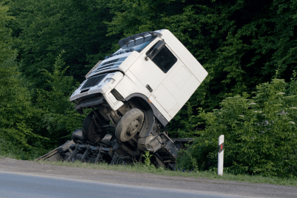 18 wheeler accident attorney case example showing overturned semi truck crash scene