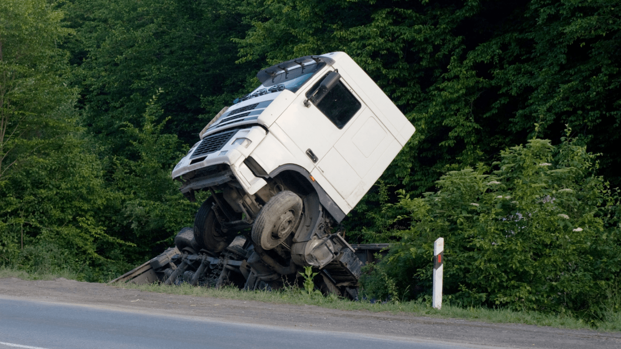 18 wheeler accident attorney case example showing overturned semi truck crash scene