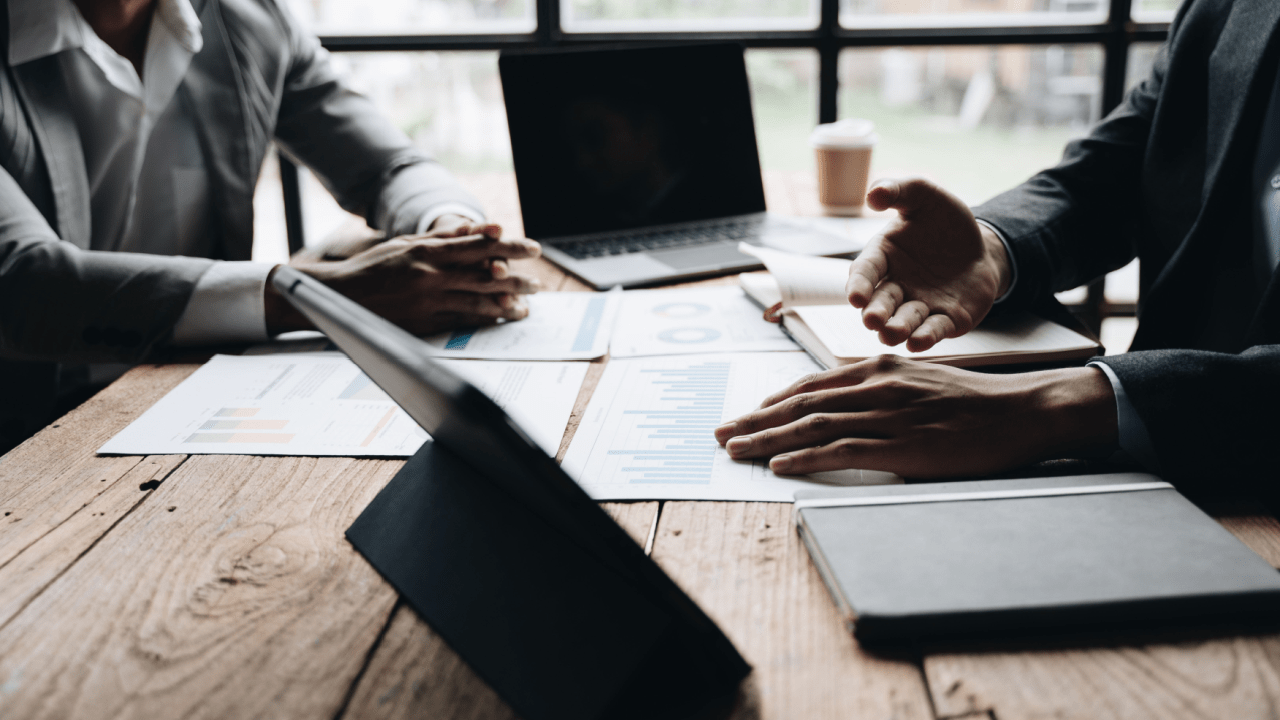 Car accident attorney consulting with client on how do I get the most for my car accident settlement strategies