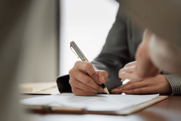Professional writing notes about is there anything you shouldn't tell your lawyer during legal consultation