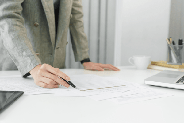 Professional attorney reviewing fee agreements to explain what percent do accident lawyers take from settlements