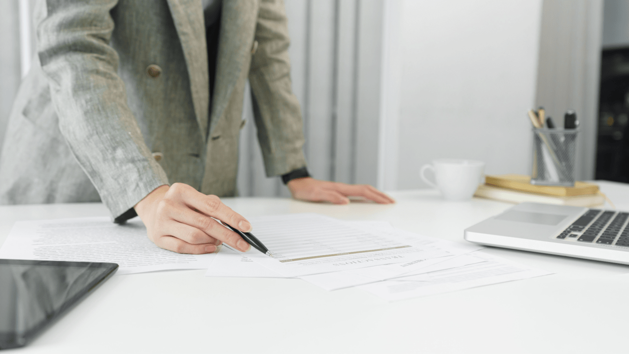 Professional attorney reviewing fee agreements to explain what percent do accident lawyers take from settlements