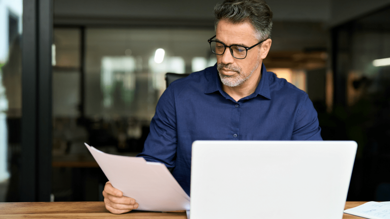 Lawyer reviewing documents about can a personal injury lawyer drop your case situations