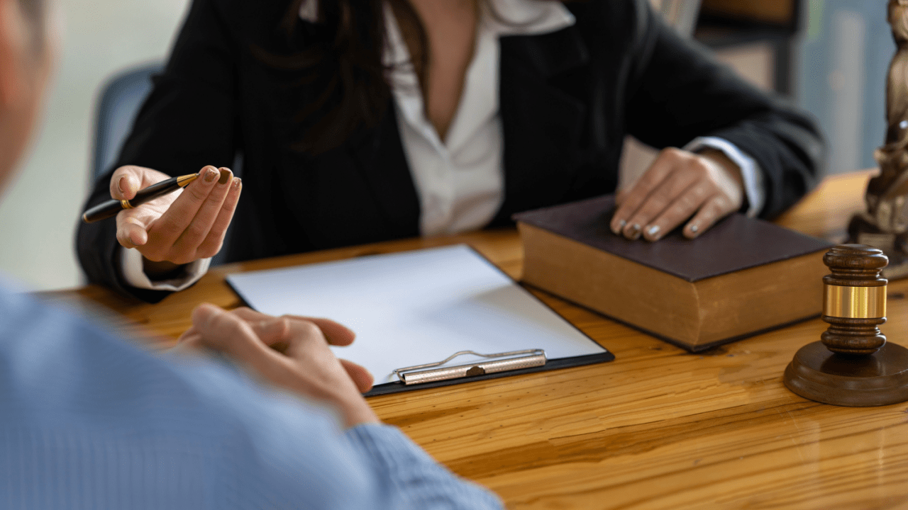 Legal consultation showing what happens after a truck accident with attorney and client discussing case details