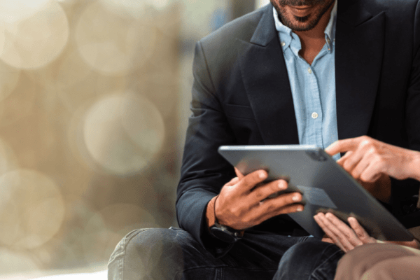 Professional reviewing what not to say to insurance after an accident guidelines on tablet device