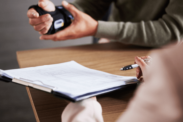 What should I expect from my personal injury lawyer consultation - client and attorney reviewing legal documents and case materials