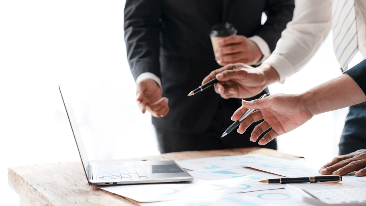 Professional business meeting discussing can a lawyer steal your settlement concerns with legal documents and laptop consultation