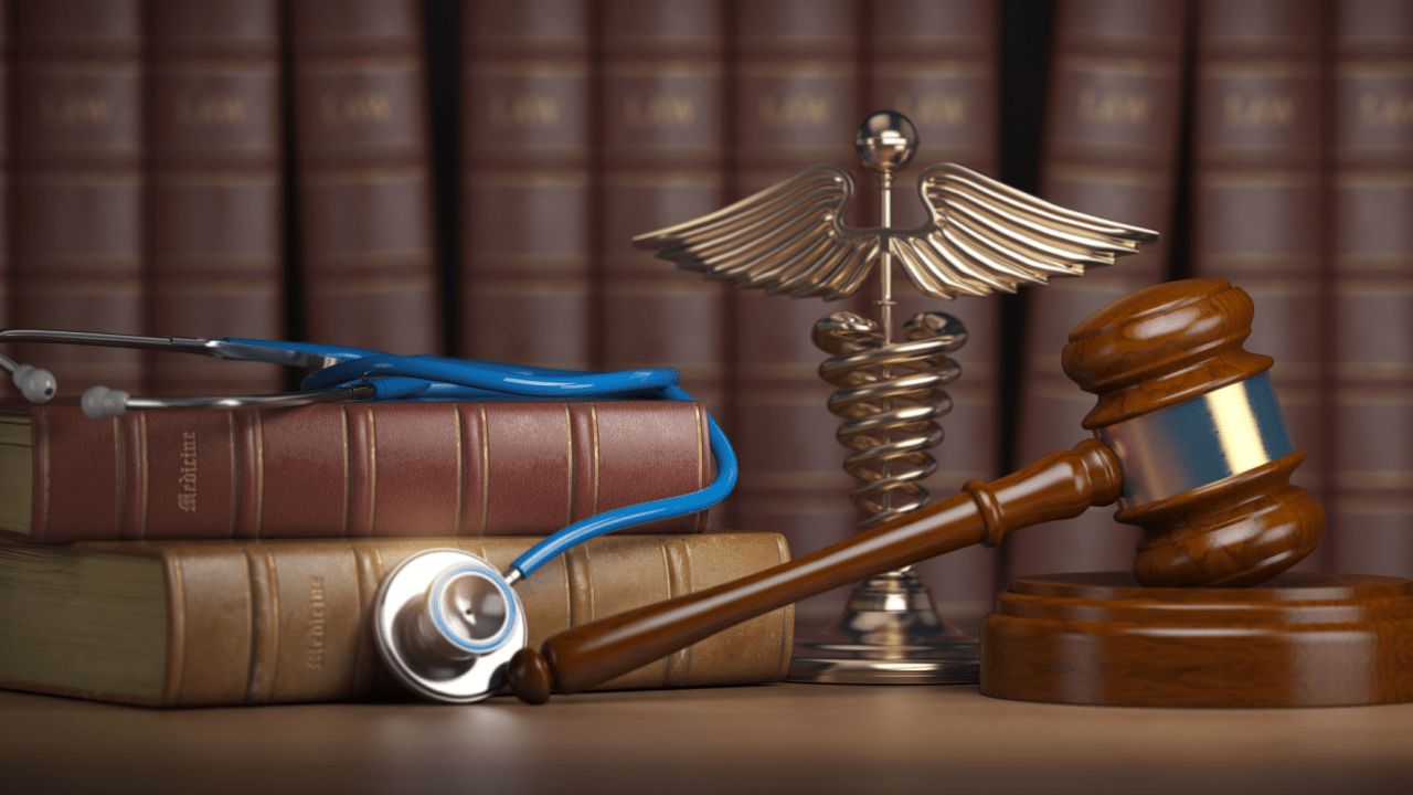 Medical stethoscope and legal gavel representing how often do personal injury lawyers win cases involving medical evidence
