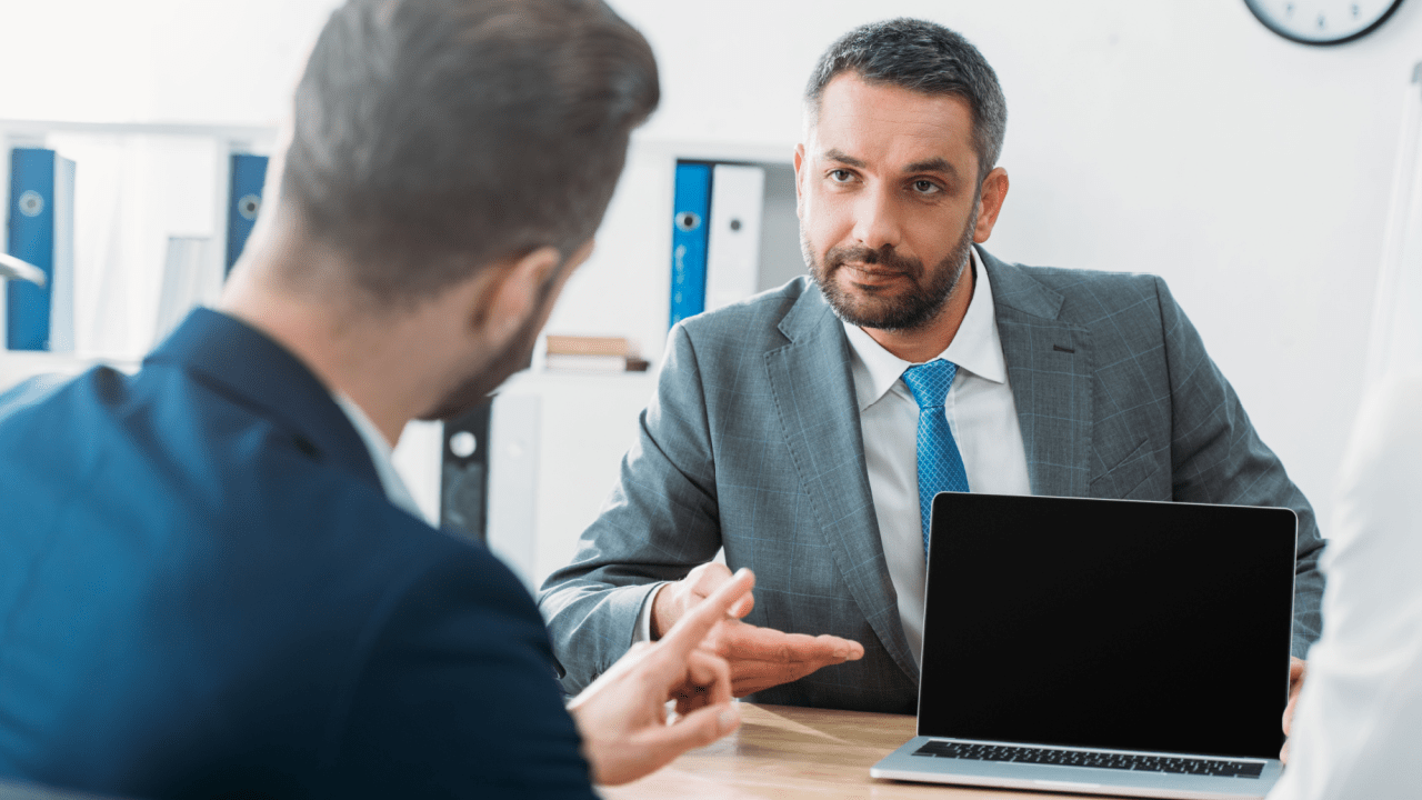 Attorney consultation answering what kind of lawyer do I need for a truck accident in professional office setting