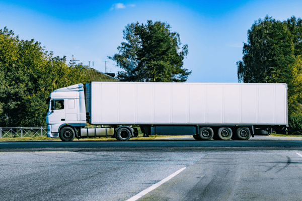 Commercial truck on highway illustrating what is the 70 hour rule regulations for driver safety