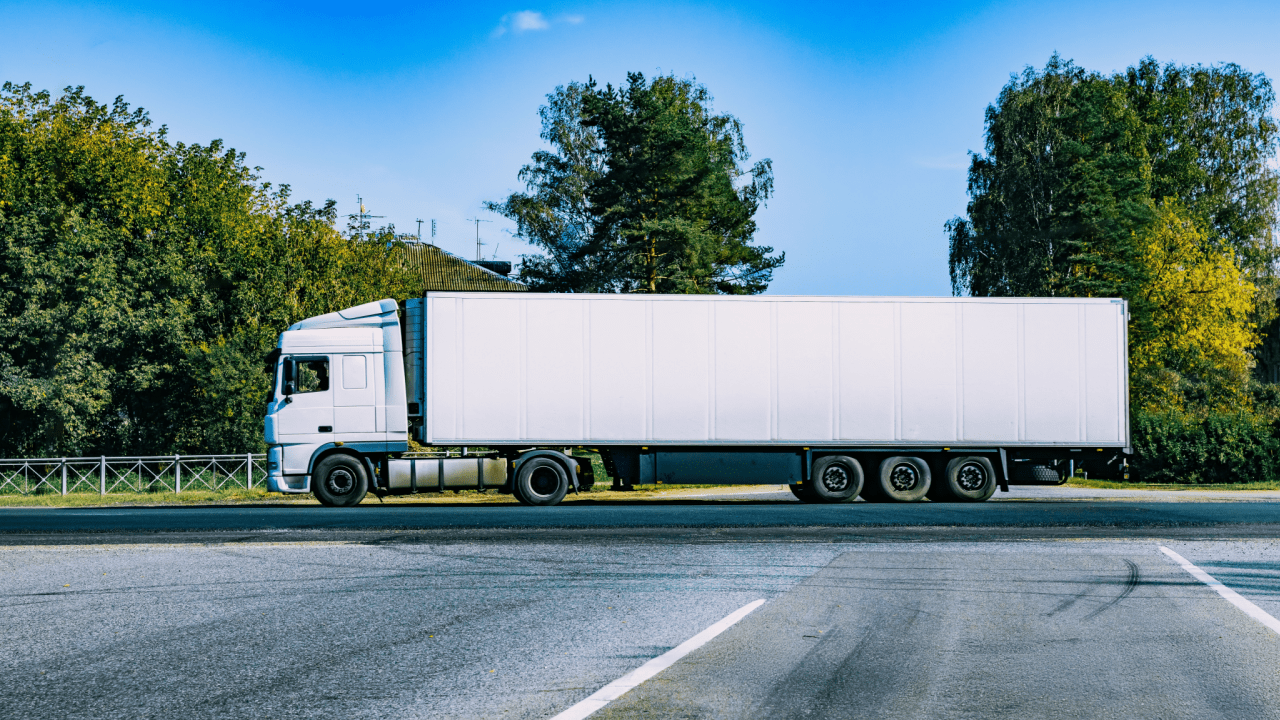 Commercial truck on highway illustrating what is the 70 hour rule regulations for driver safety