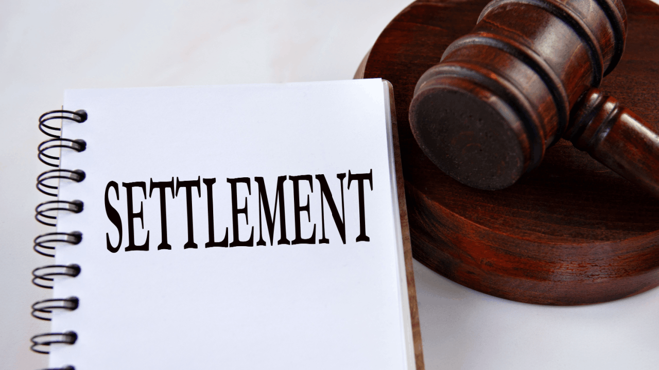 When to accept or reject a truck accident settlement offer shown through legal gavel and settlement document for claim decision