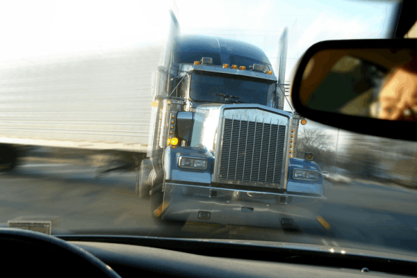 Commercial semi-truck on highway illustrating what evidence is used to determine truck accident liability