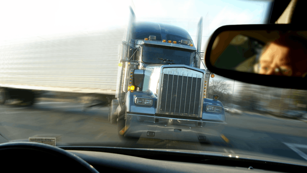 Commercial semi-truck on highway illustrating what evidence is used to determine truck accident liability