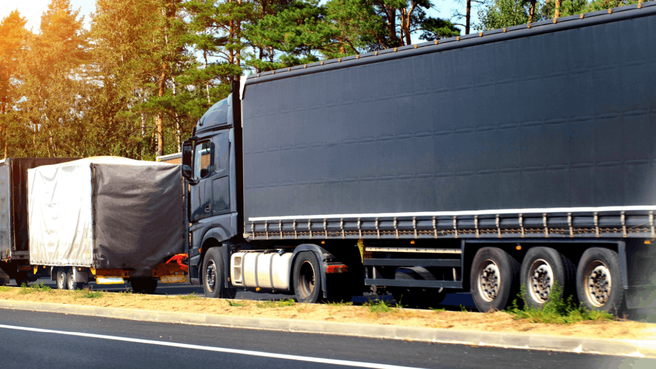 Commercial truck on highway illustrating what liability is in a truck accident claim