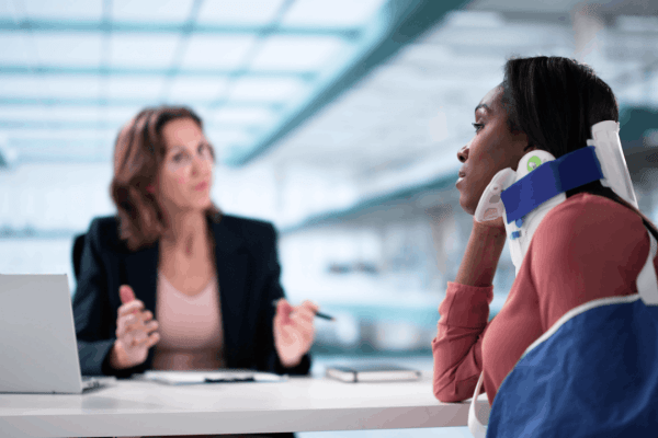 Steps in filing a claim — injury victim consulting a truck accident attorney