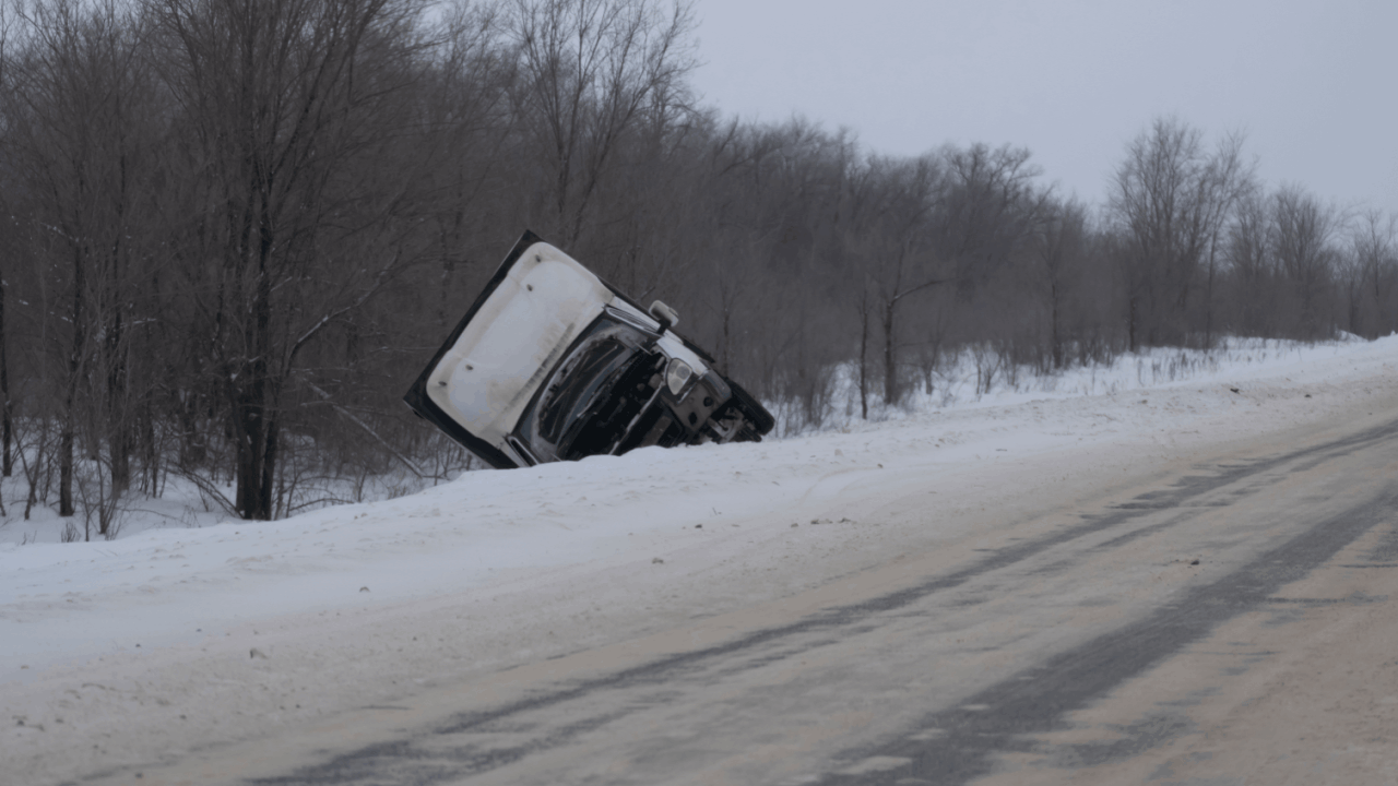 What happens if a truck driver crashes in winter road conditions