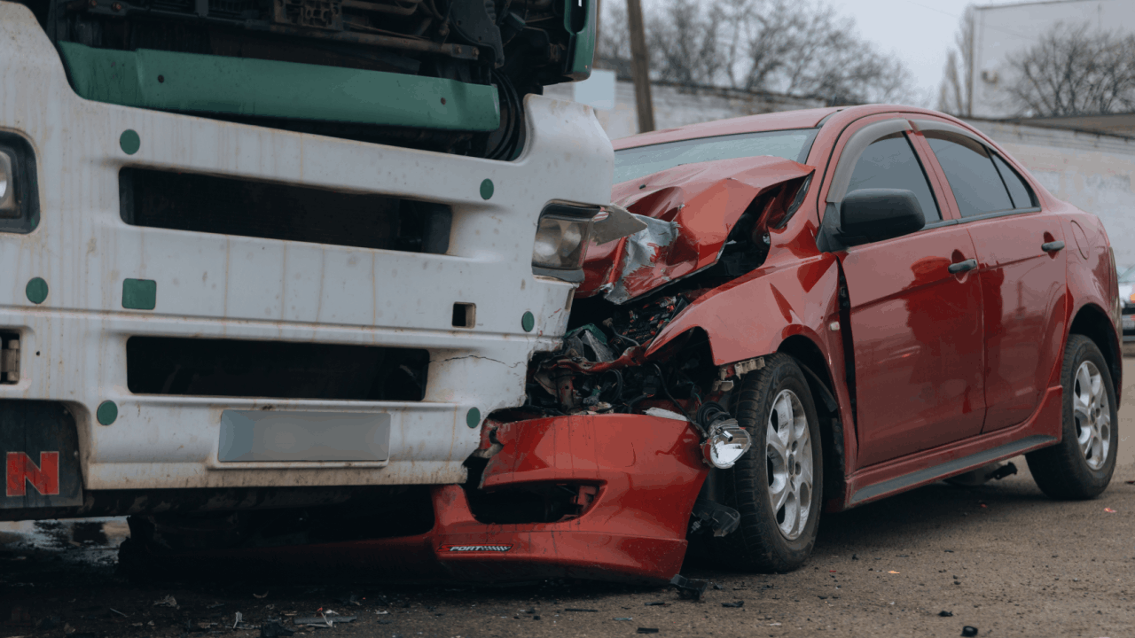 semi truck accident statistics red car crushed by large truck