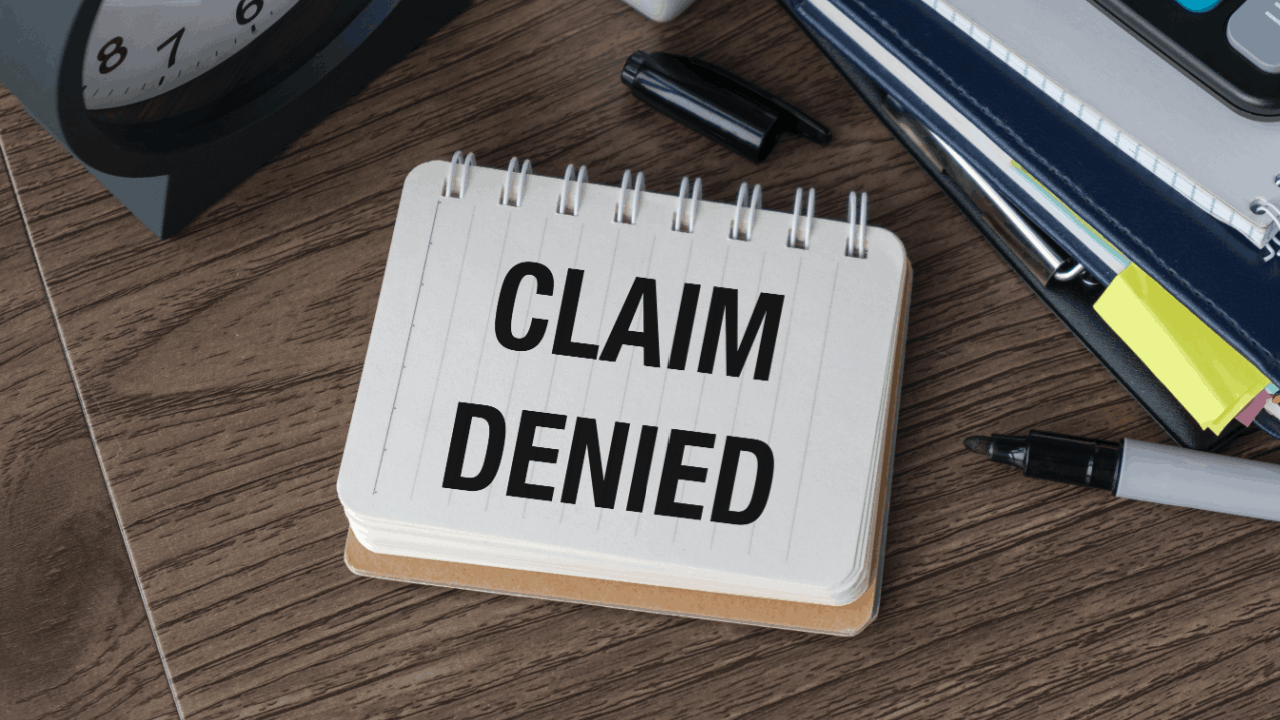appeal a denied truck accident claim notepad on desk