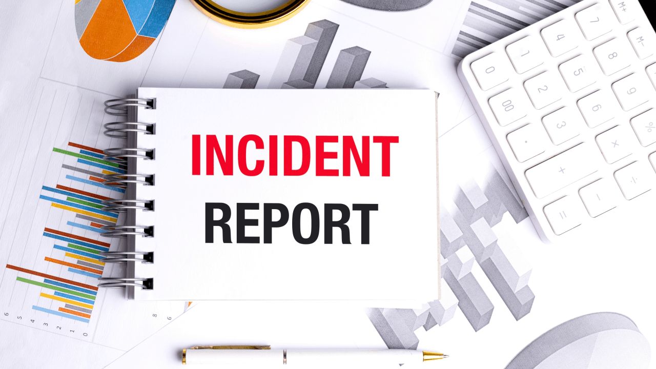 Incident report notebook with truck accident statistics charts and data