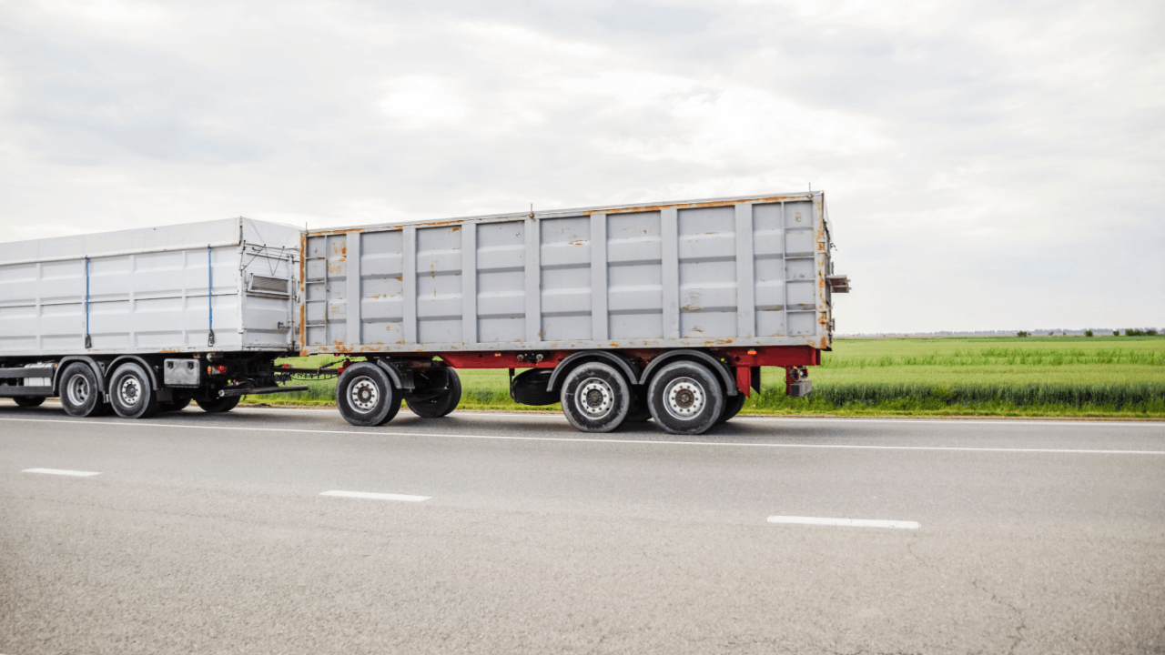 Truck on highway illustrating when you can sue if the trucker had a fraudulent CDL