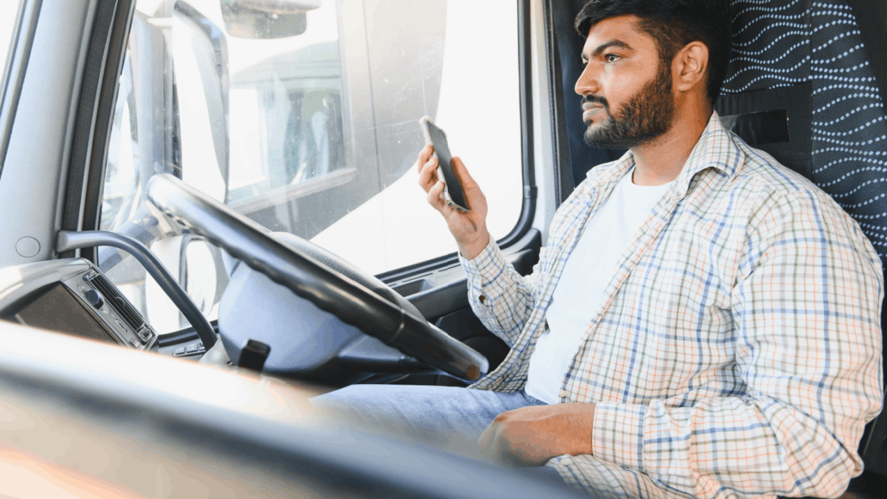 Truck driver in cab illustrating how to prove a carrier hired an unsafe driver